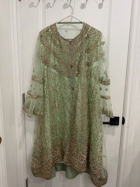 Pakistani Embellished Mint Green Party Dress with Gold Accents